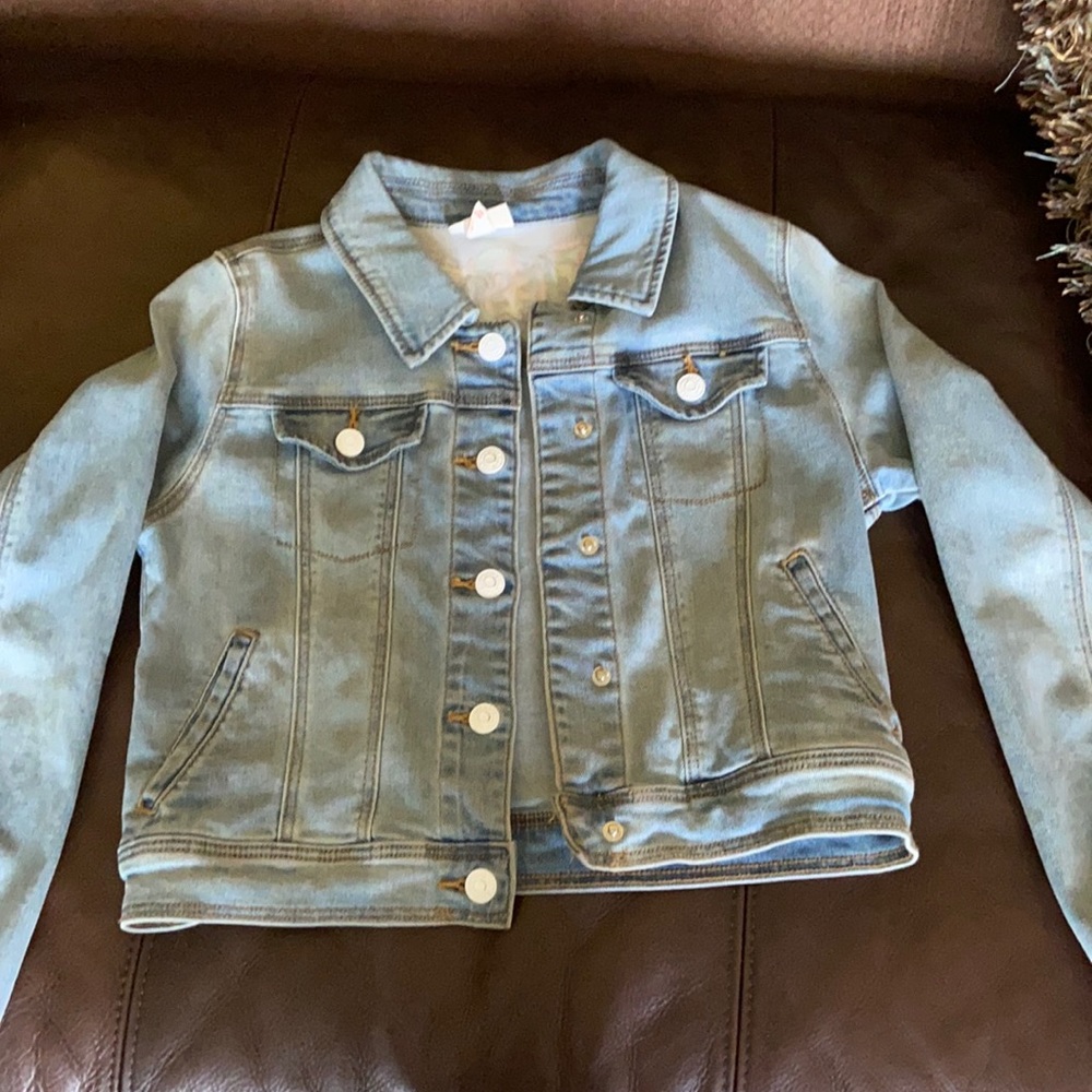 Jean jacket rainbow AWESOME embroidered on back.